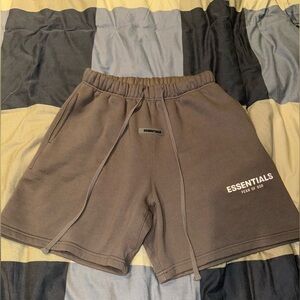 dark green essentials shorts.